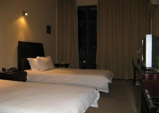 Baolong Homelike Hotel - Wusong Branch Shanghai Zimmer foto